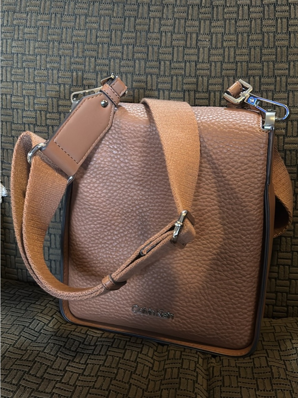 Calvin Klein Pebbled Leather Messenger Bag in Cognac